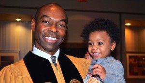 Smiling 15-month-old grandson who inspired three business leadership lessons.